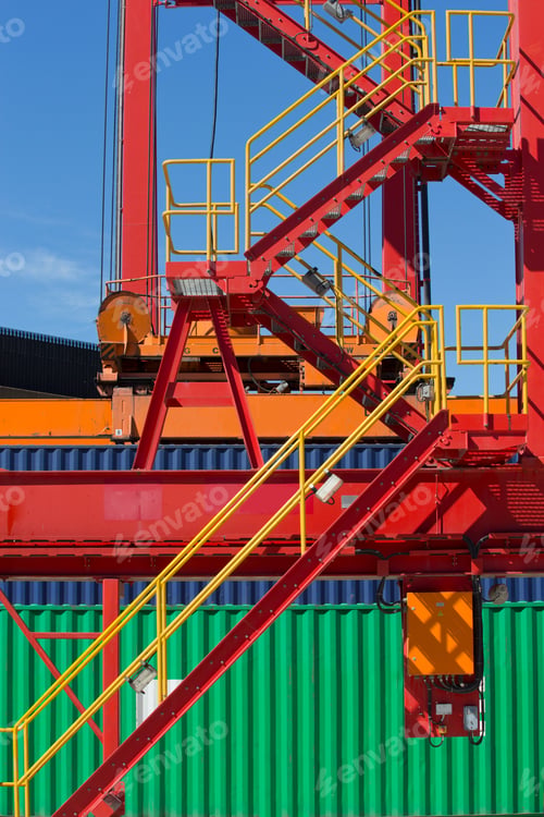 Preview: Metal Stairs In A Dockyard Among Cargo Containers