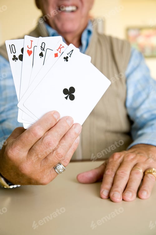 Preview: An Elderly Man Playing Cards