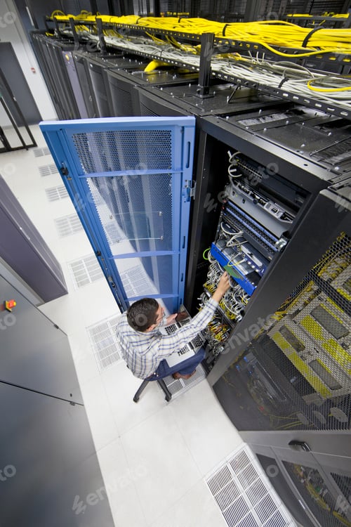 Preview: Top Angle Shot Of A Technician Working In The Data Center On The Server