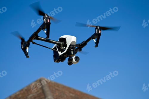 Preview: Surveillance Drone Flying In Blue Sky