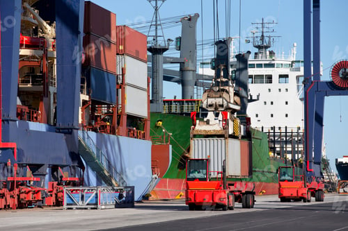 Preview: A Crane Loading Cargo Containers Onto A Container Ship At A Commercial Dock.