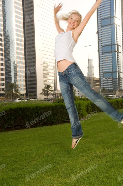 Preview: A Young Woman Jumping For Joy