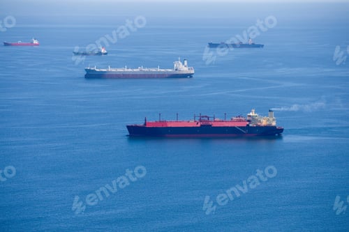 Preview: Wide Shot Of The Side View Of A Natural Gas Cargo Ship Travelling At The Sea.