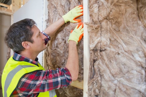 Preview: Builder Fitting Insulation Fibre To Room Walls