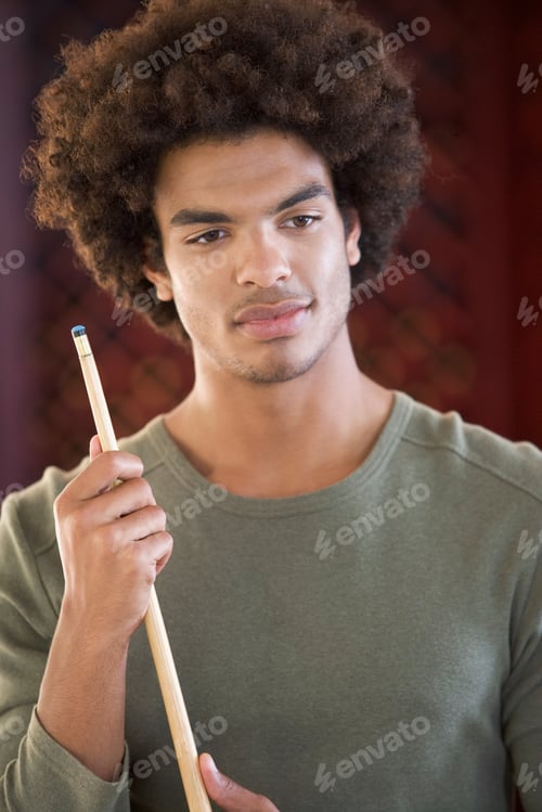 Preview: A Young Man Playing Pool
