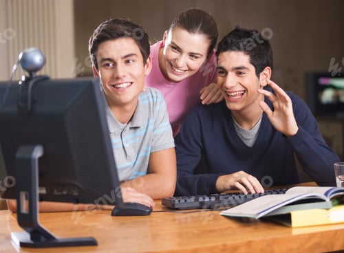 Preview: Three Teenage Friends Using A Computer