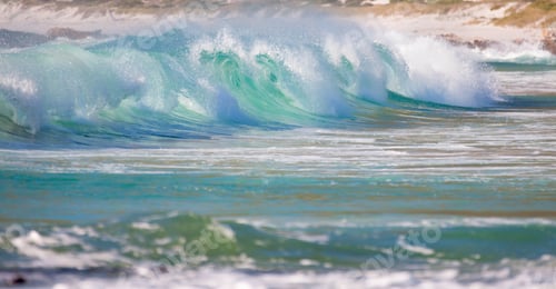 Preview: A Wide Screen View Of A Large Wave Breaking Along The Coast.