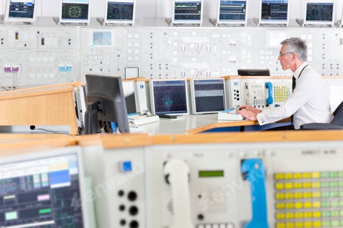Preview: Senior Engineer At His Control Desk Using A Computer In The Control Room Of A Nuclear Power Station