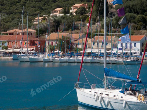 Preview: Greece, Kefalonia, Fiskardo, View Of Yachts And Sunny Coastal Harbour