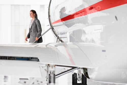 Preview: A Businesswoman Walking Out Of A Private Jet
