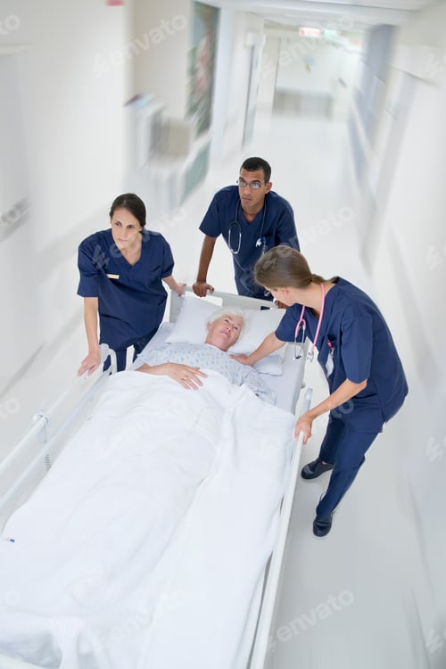 Preview: Top Angle Shot Of The Emergency Medical Team With A Patient On The Gurney