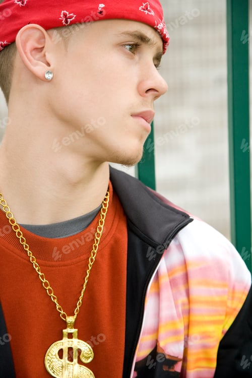 Preview: A Teenage Boy Wearing A Bandana And Money Chain