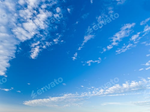 Preview: White Clouds Against Blue Summer Sky