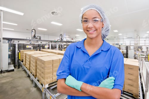 Preview: Portrait Of Smiling Worker At Food Packaging Production Line