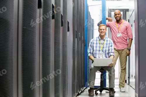 Preview: Wide Shot Of Two Smiling Technicians Working In The Data Center