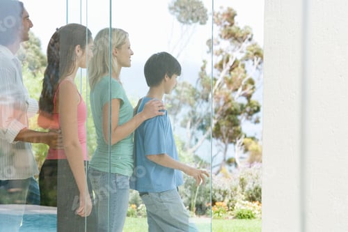 Preview: A Family Looking At Their Garden