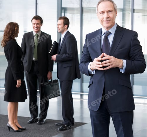 Preview: A Portrait Of A Mature Businessman In The Foyer Of An Office Building