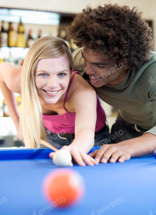 Preview: A Teenage Couple Playing Pool
