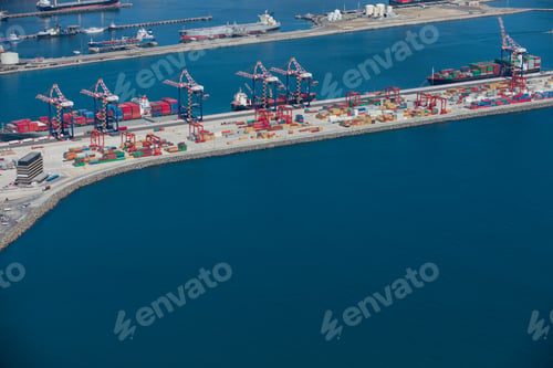 Preview: Aerial View Of A Commercial Dock With Stacked Cargo Containers And Gantry Cranes