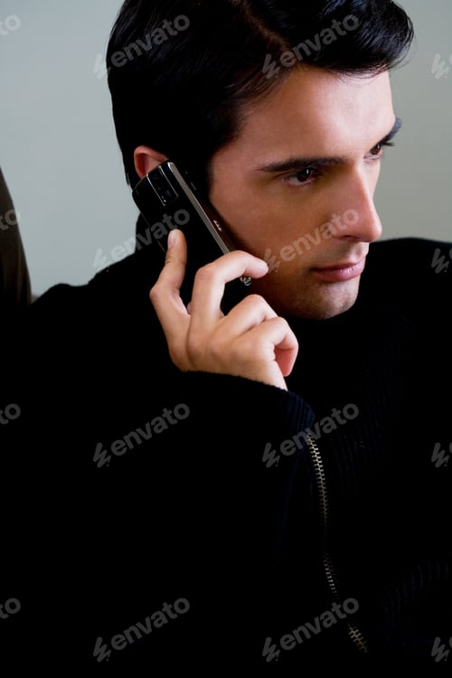 Preview: Portrait Of A Man Using A Mobile Phone