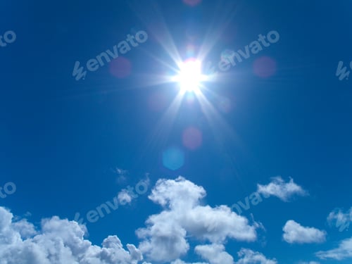 Preview: Sunbeams Shining From Sun In Blue Sky