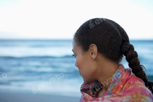 Preview: Close-Up Of A Woman Standing On Beach At Sunset And Looking At Horizon Over Sea With Copy Space.