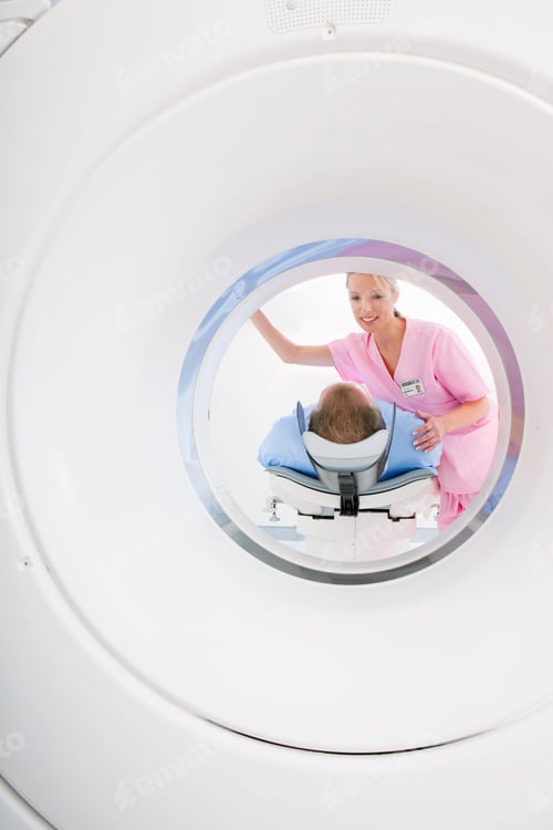 Preview: Vertical Shot Of The Nurse Assisting Patient At The Ct Scanner Tube In The Hospital