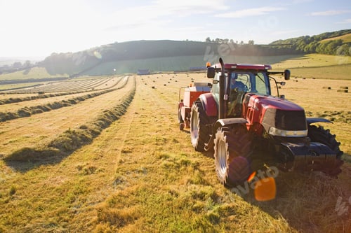 Preview: Tractor Baling Hay In The Field