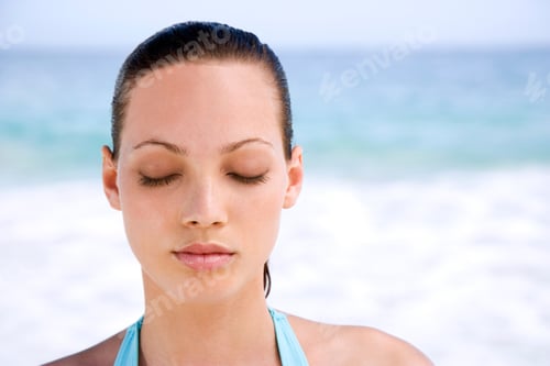 Preview: Portrait Young Woman On The Beach With Eyes Closed