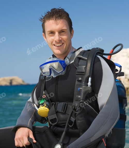 Preview: A Male Scuba Diver Sitting On A Boat