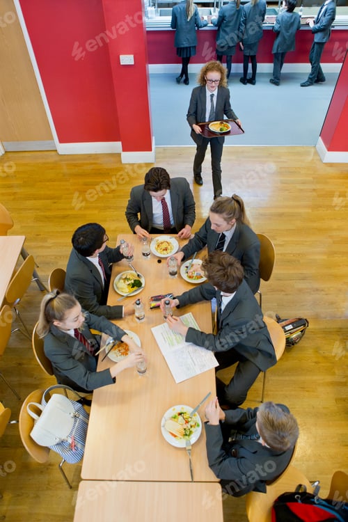 Preview: School Children Having Lunch In School Canteen