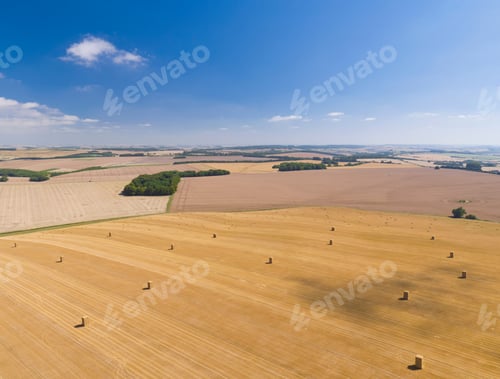Preview: Aerial View Of Harvested Farm Fields With Bales Of Straw