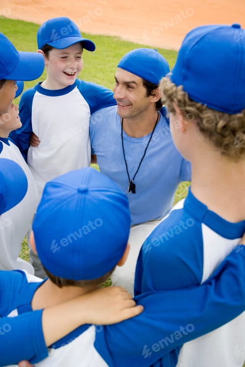 Preview: Youth Baseball Team In Huddle With Their Coach