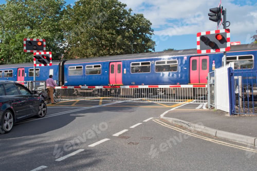 Preview: Railway Passing By The Road As The Vehicles Wait