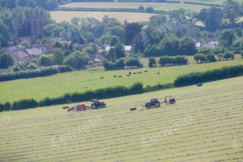 Preview: Tractors Baling And Wrapping Hay In Field, Dorset, Uk