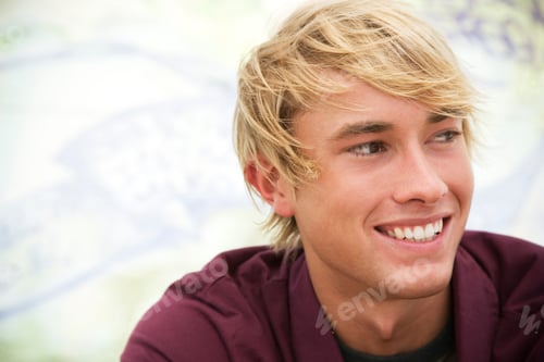 Preview: Portrait Of A Young Man In Front Of A Graffiti Covered Wall
