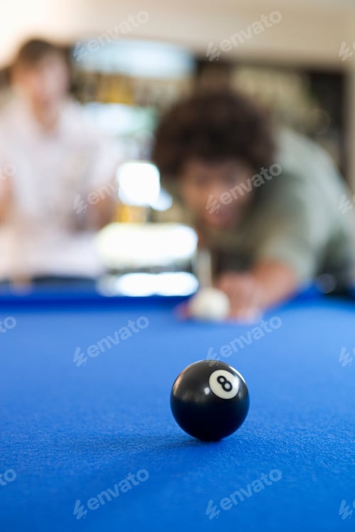 Preview: Two Young Men Playing Pool