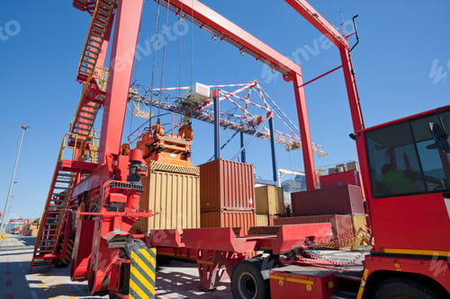 Preview: Wide Shot Of Cargo Containers Being Loaded On Lorries Using Gantry Cranes