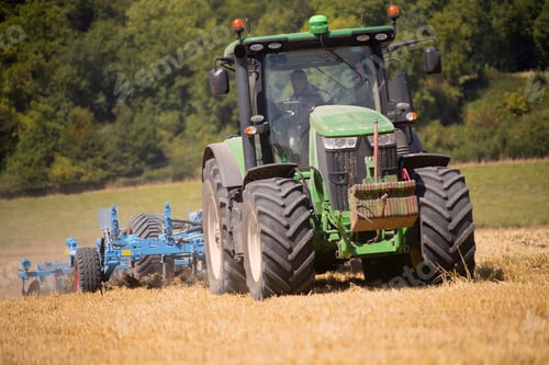 Preview: Tractor Ploughing Field Using Disc Plough