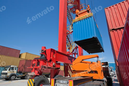 Preview: Wide Shot Of Trucks Being Loaded With Cargo Containers Using Gantry Cranes