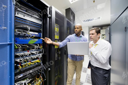 Preview: Technicians Checking The Server In The Data Center Using A Laptop