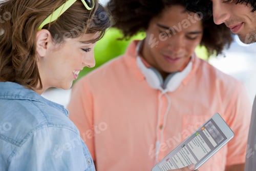 Preview: Close Up Portrait Of Smiling Friends Busy Using Digital Devices