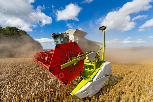 Preview: Combine Harvester Harvesting Field Of Wheat