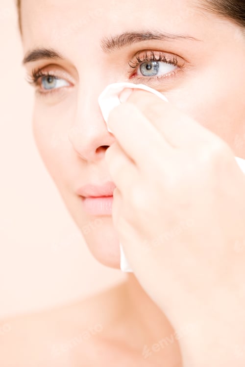 Preview: Woman Crying, Wiping Tears Away With A Tissue