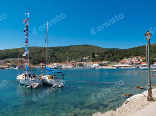 Preview: Greece, Kefalonia, Fiskardo, View Of Lamp And Yacht In Sunny Coastal Harbour
