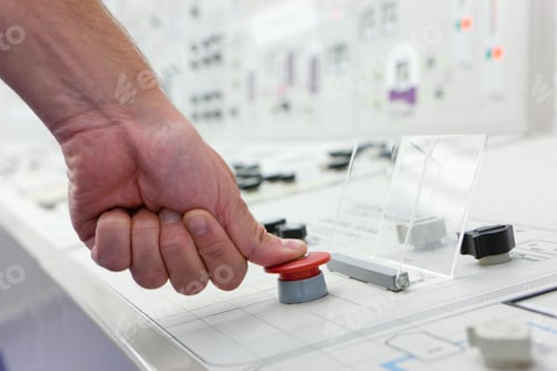 Preview: Close-Up Shot Of A Hand Pushing A Red Emergency Button On The Control Panel.