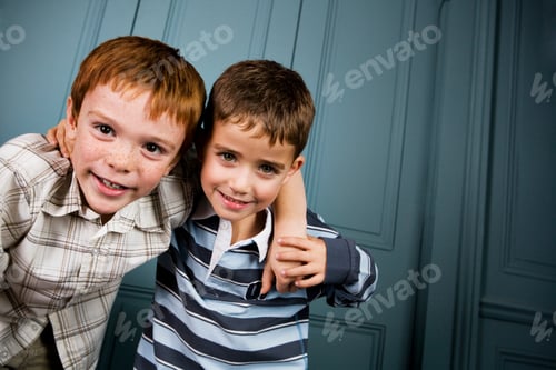Preview: Two Boys With Arms Around Each Other'S Shoulders
