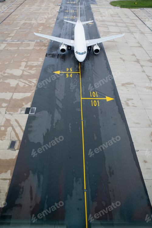 Preview: High Angle Vertical Shot Of An Aircraft On A Runway.