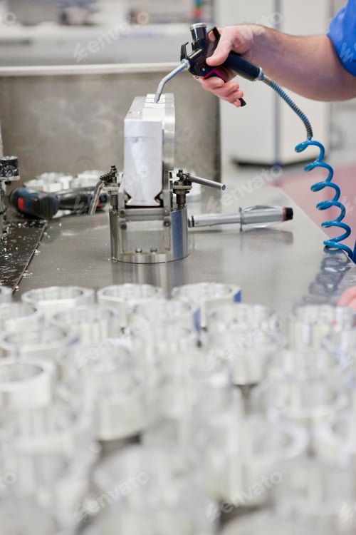 Preview: Vertical Shot Of A Technician'S Hand Working With Aluminum Products In A Hi-Tech Manufacturing