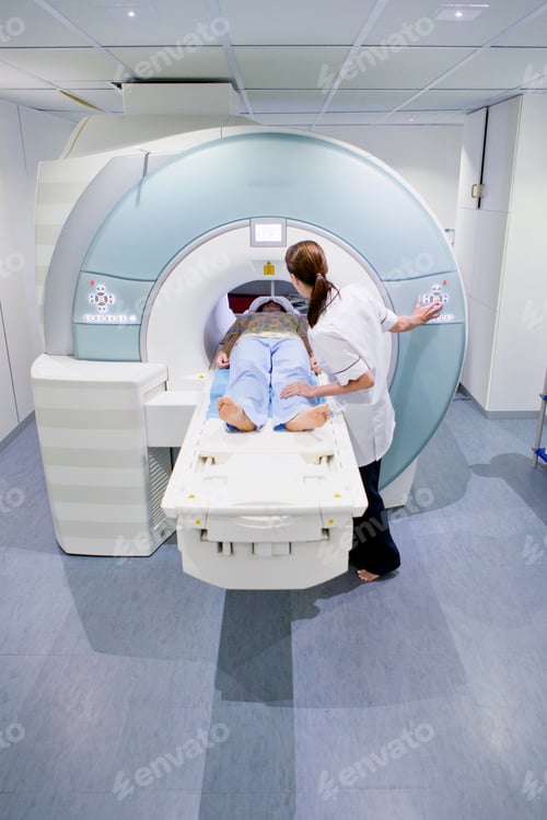 Preview: A Nurse And A Patient Starting The Mri Scan In The Hospital